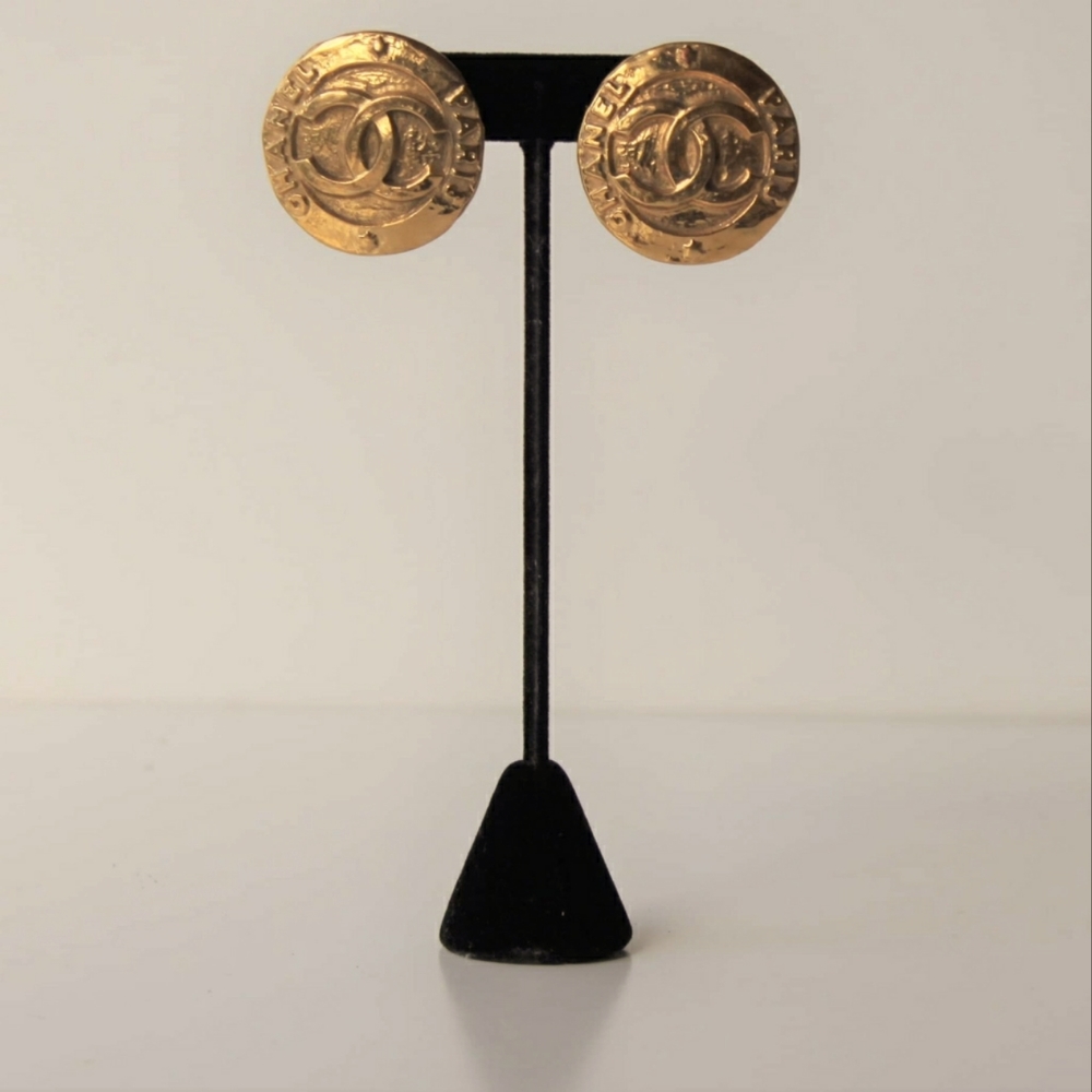 CHANEL gold medallion clip on earrings